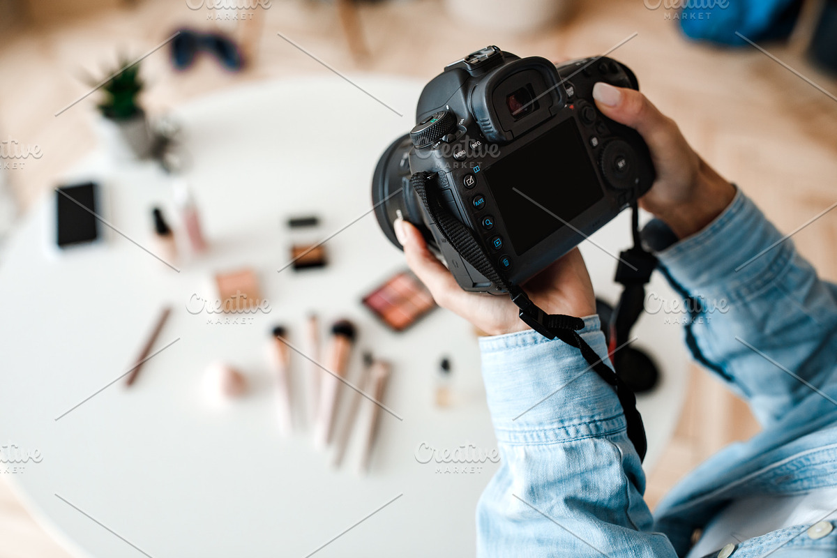 Unrecognizable Female Photographer Taking Photo Of Cosmetic Products Indoor, Cr, a Photo by Prostock-Studio (Photo 1 of 3)