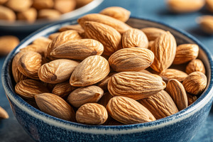 Almonds displayed in a rustic bowl, a Photo by Beautiful things