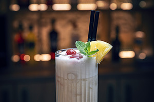 Creamy, tropical pina colada cocktail, a Photo by Grafvision photography