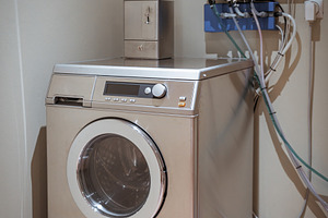Hostel coin laundry machine, an Industrial Photo by SkyNext