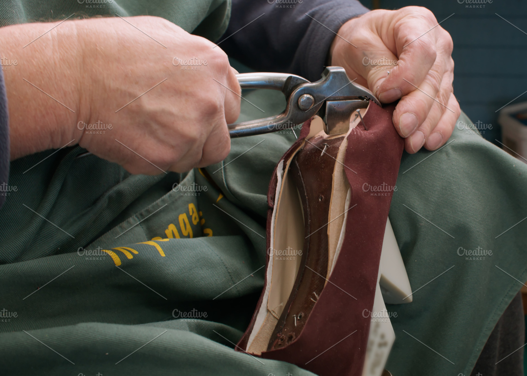 Fixing footwear professional shoemaker handmade, a Person Photo by Photo Drive Studio