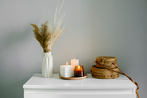 Home interior decor in beige neutral colors. White dresser with dried flowers i, a Beauty & Fashion Photo by Anikona