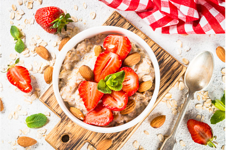 Oatmeal porridge with fresh, a Food & Drink Photo by Nadia-nb