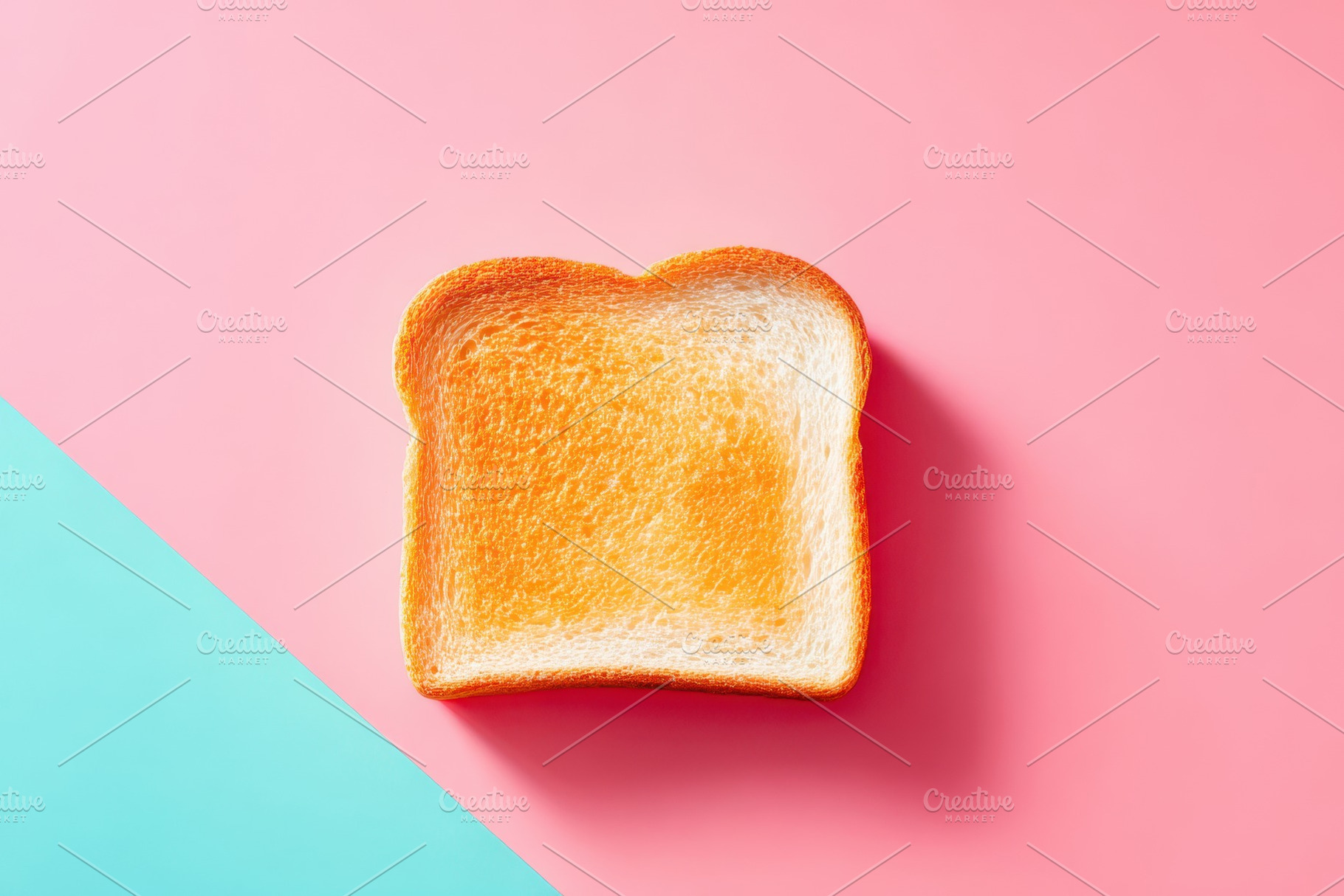 Pink loaf of bread on gradient background, a Food & Drink Photo by AlyaAnd