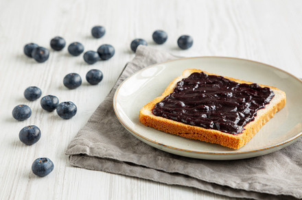 Healthy Blueberry Jelly and Toast on a Plate, side view., a Food & Drink Photo by LiudmylaChuhunova