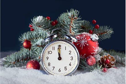 Vintage alarm clock with fir twigs, a Holiday Photo by tilialucida