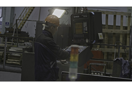 Worker with control panel for, an Industrial Photo by Media Whale Stock