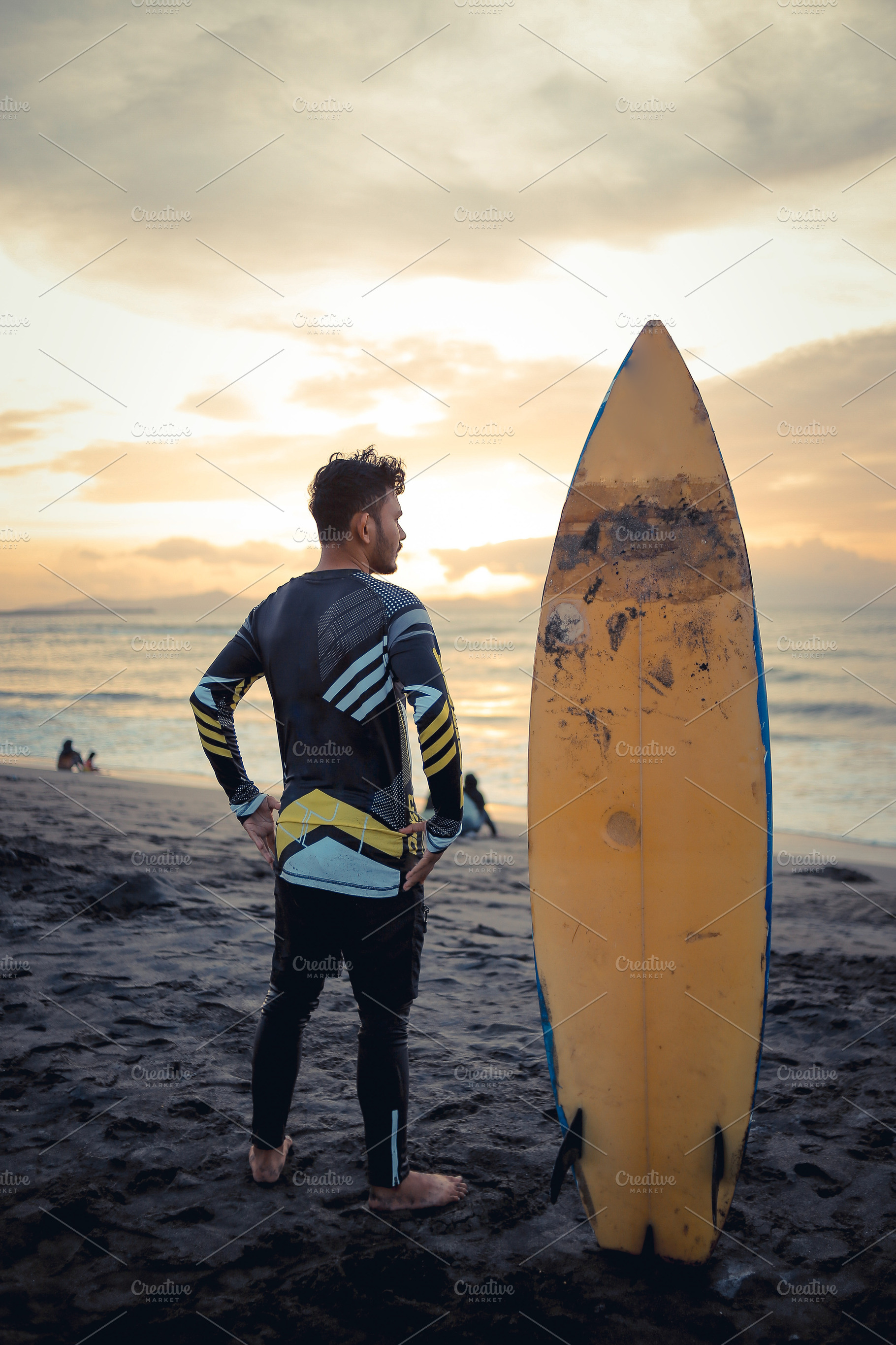Surfer Watching Sunset at the Beach, a Sports & Recreation Photo by bastera