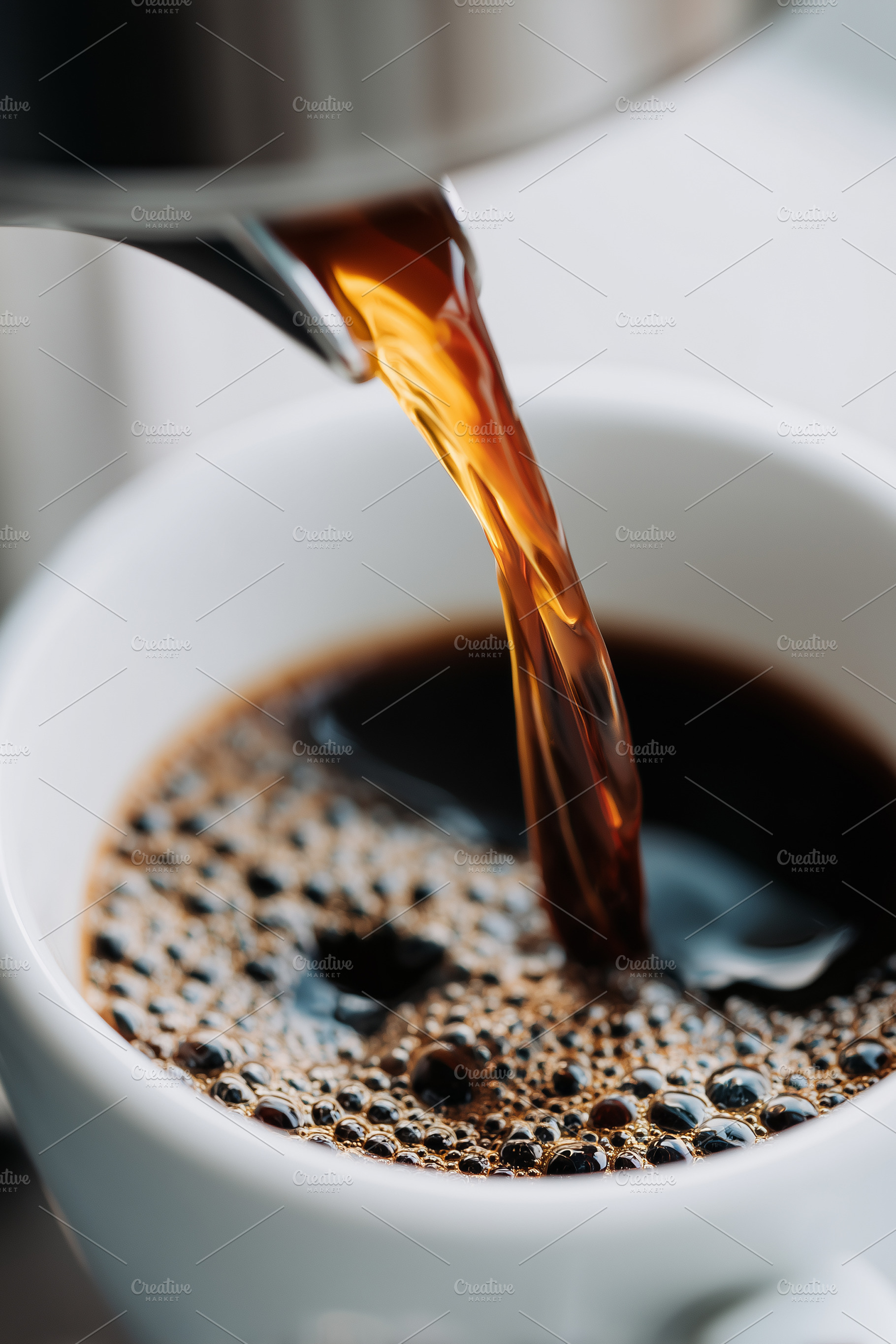 Freshly brewed coffee being poured, a Food & Drink Photo by MistyDay