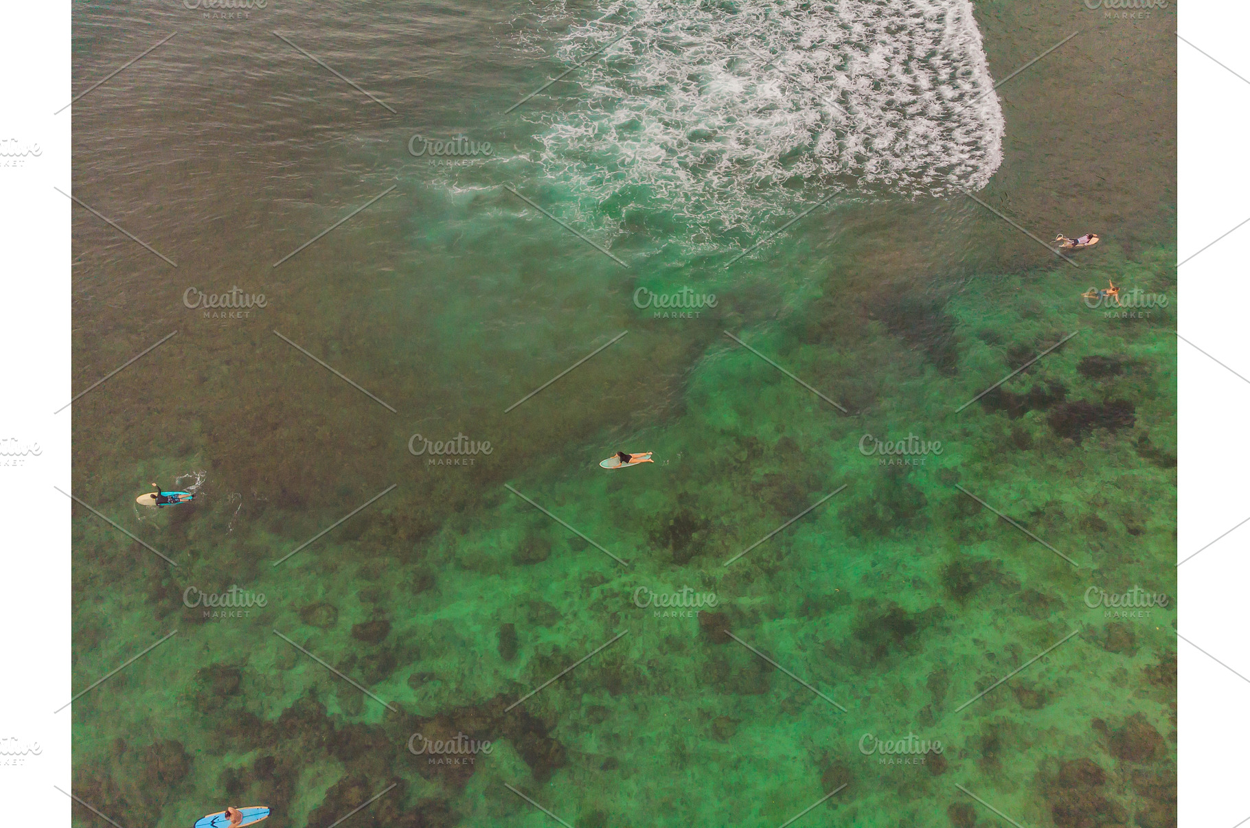 Surfers on the waves in the ocean, a Sports & Recreation Photo by Elizaveta Galitskaya