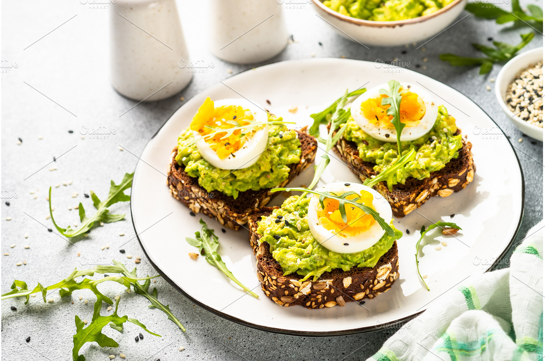 Whole grain bread with avocado and, a Food & Drink Photo by Nadia-nb