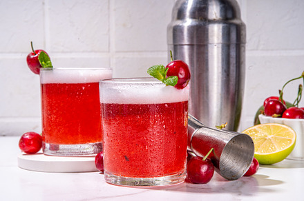 Cherry and lime alcoholic booze cocktail, a Food & Drink Photo by Rimma