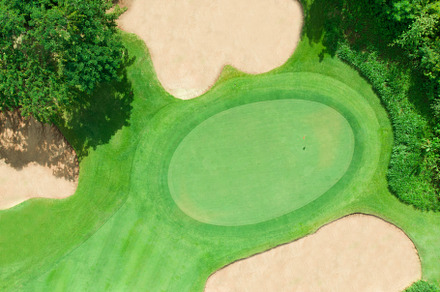 Aerial view of golf course containing above, aerial, and aerial view