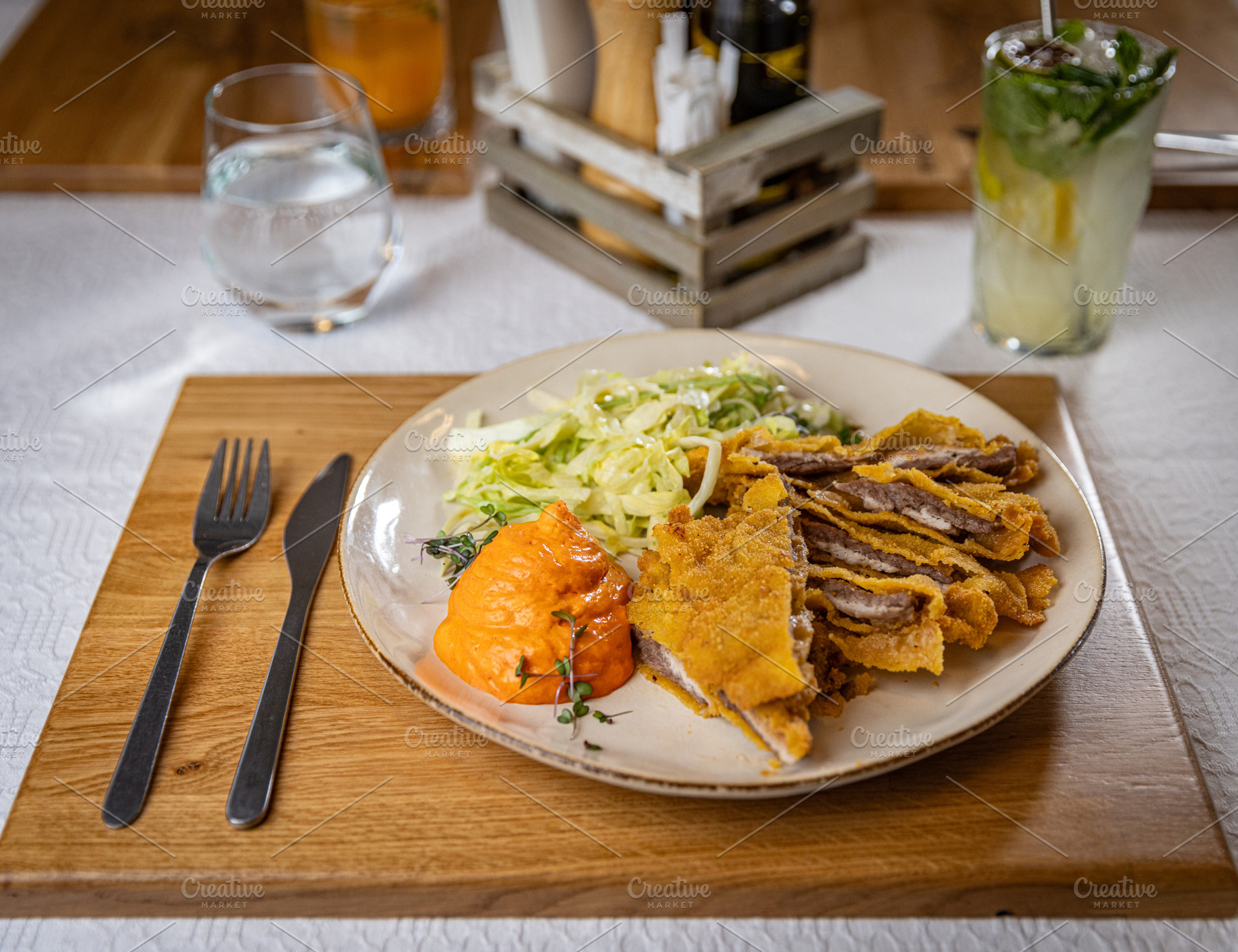 Golden brown breaded cutlet, a Photo by Grafvision photography