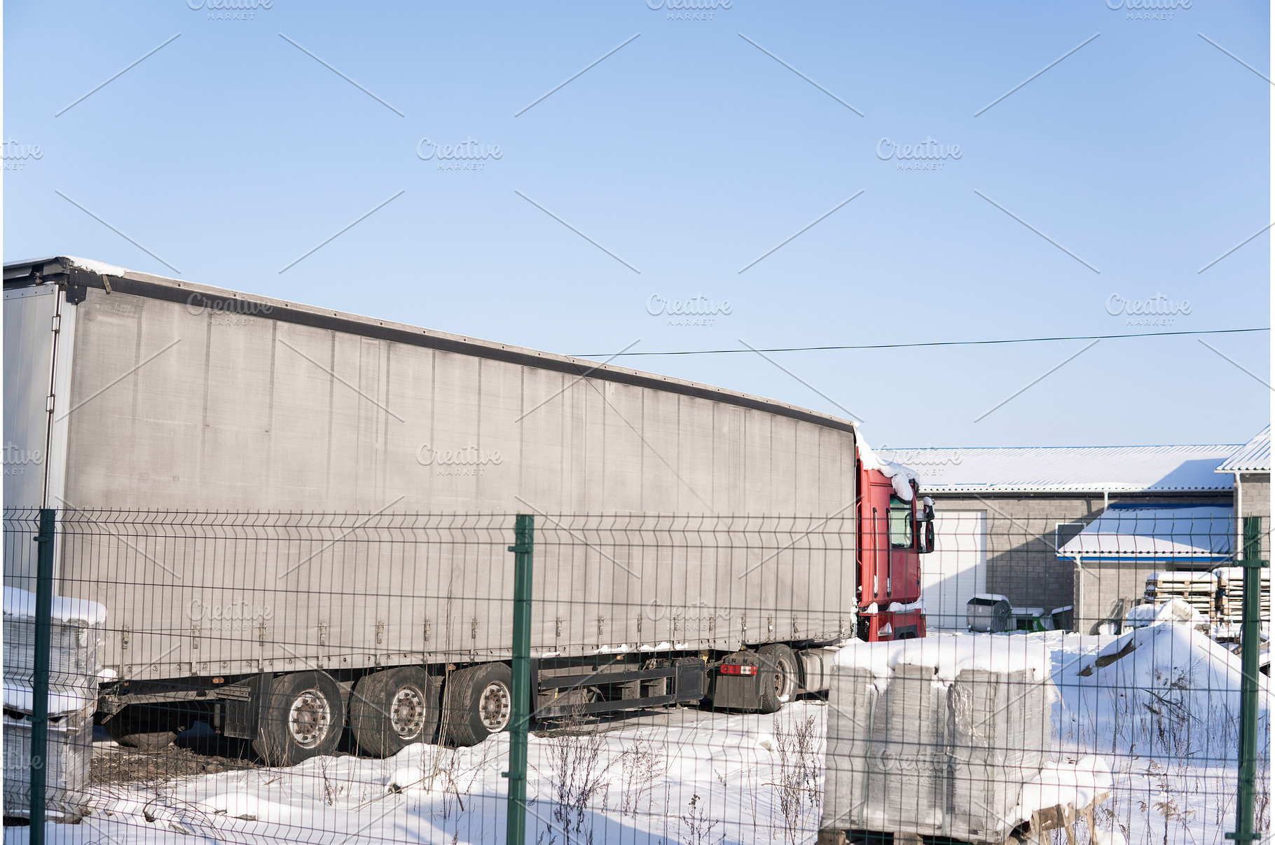 Full view of long trailer truck, a Transportation Photo by volodymyrshtun13795