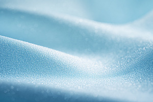 Shimmering light reflecting on soft blue fabric waves creating a, a Photo by Studio ANNA