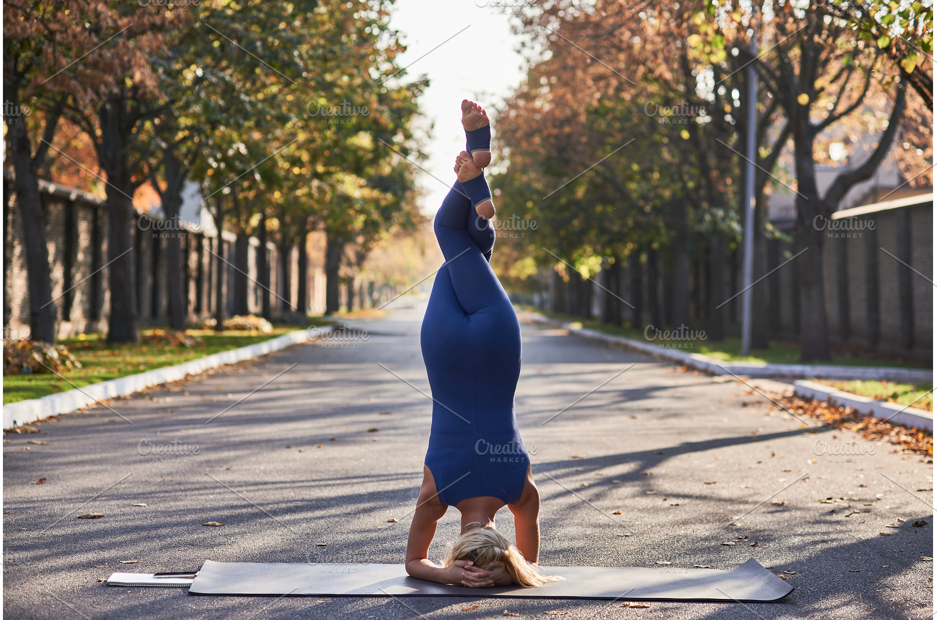 Outdoor yoga woman in headstand, a Nature Photo by wip3out