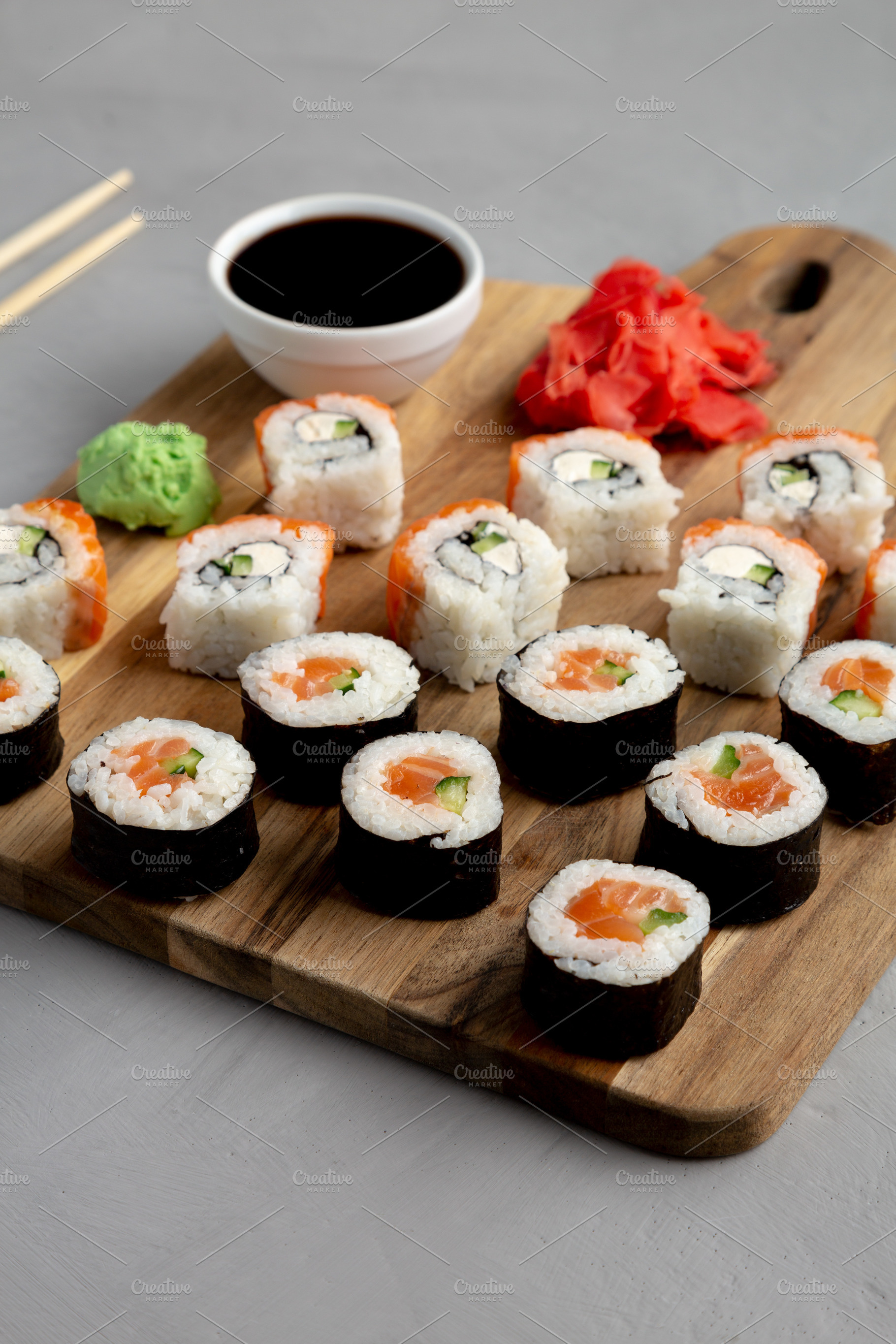 Homemade Sushi Platter with Wasabi and Soy Sauce on a Board, low, a Food & Drink Photo by LiudmylaChuhunova