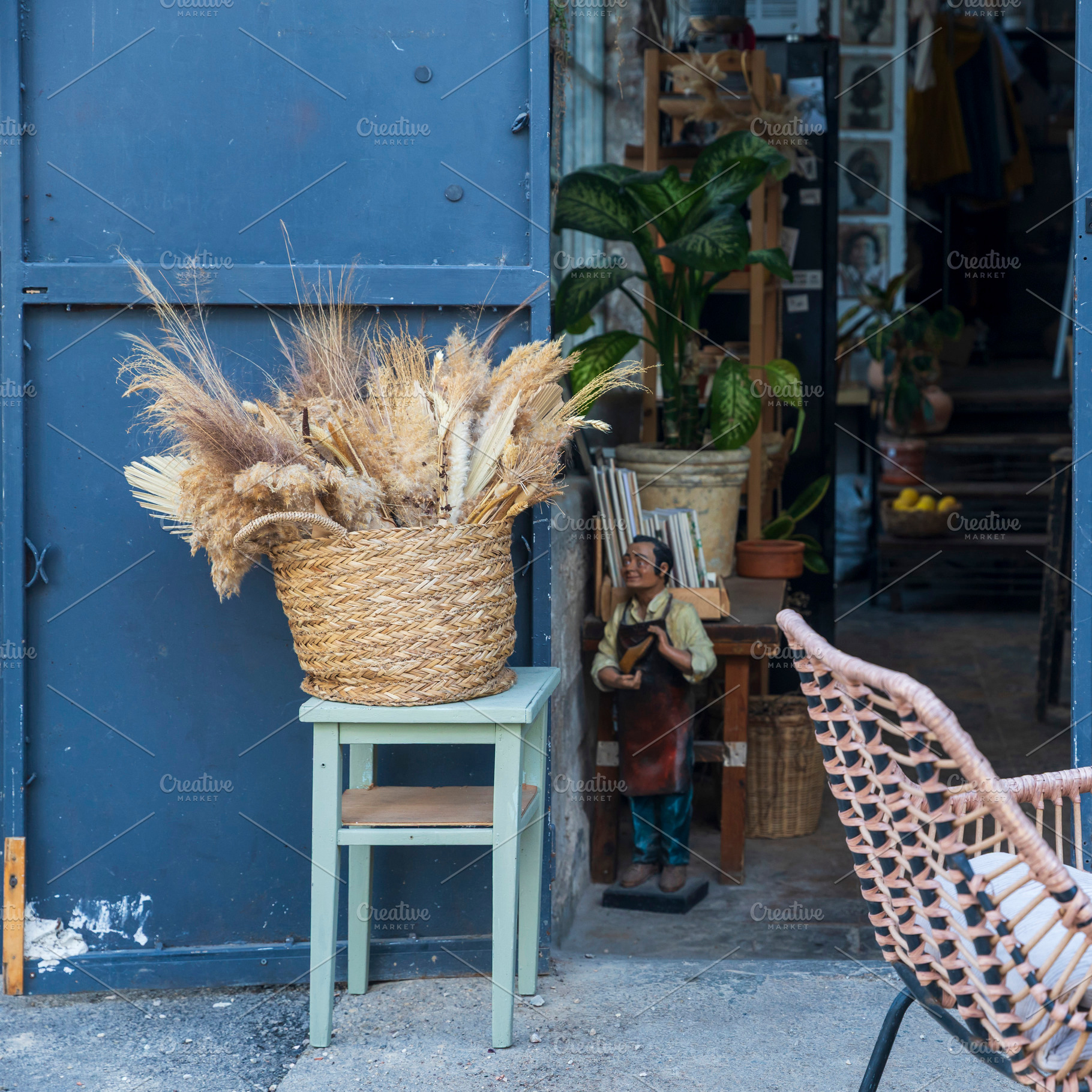 Dried pampas grass in a woven basket, an Abstract Photo by Imaginarium