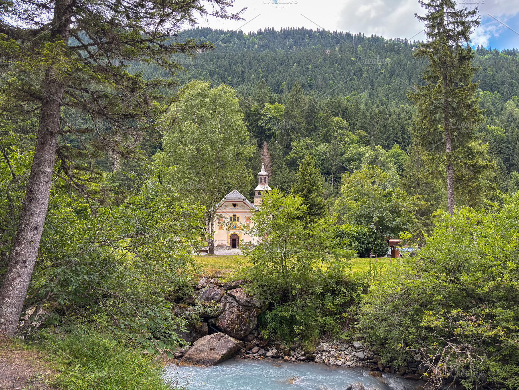 Mountain church by river in forest at Les Contamines-Montjoie, F, a Nature Photo by GoodGoods
