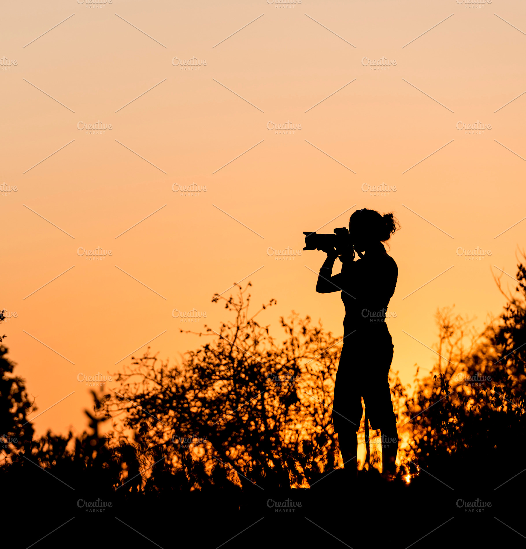 Female Photographer Silhouette, a Person Photo by THP Creative