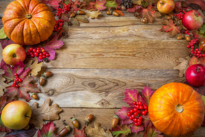 Frame of pumpkins, apples, acorns