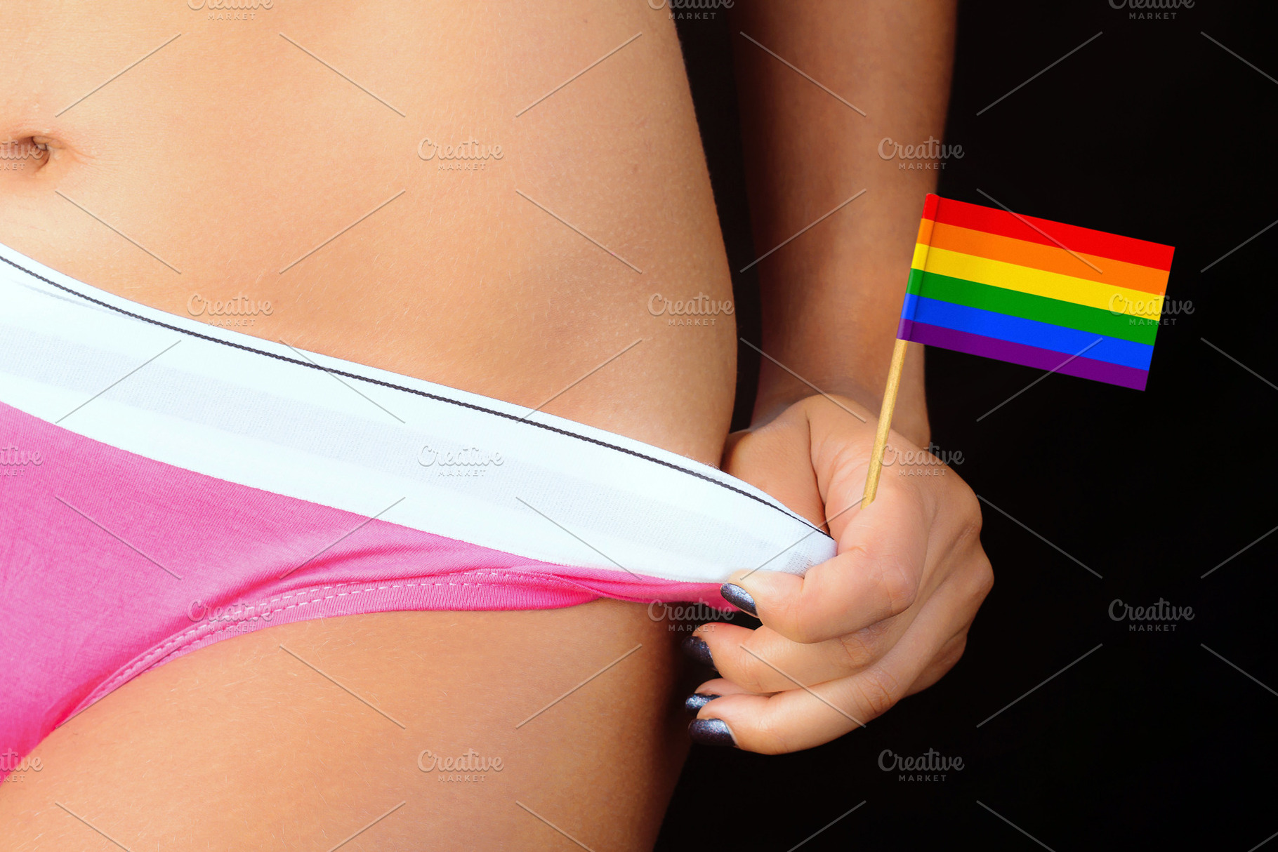 Sexy woman with LGBT rainbow flag, a Person Photo by BOOCYS