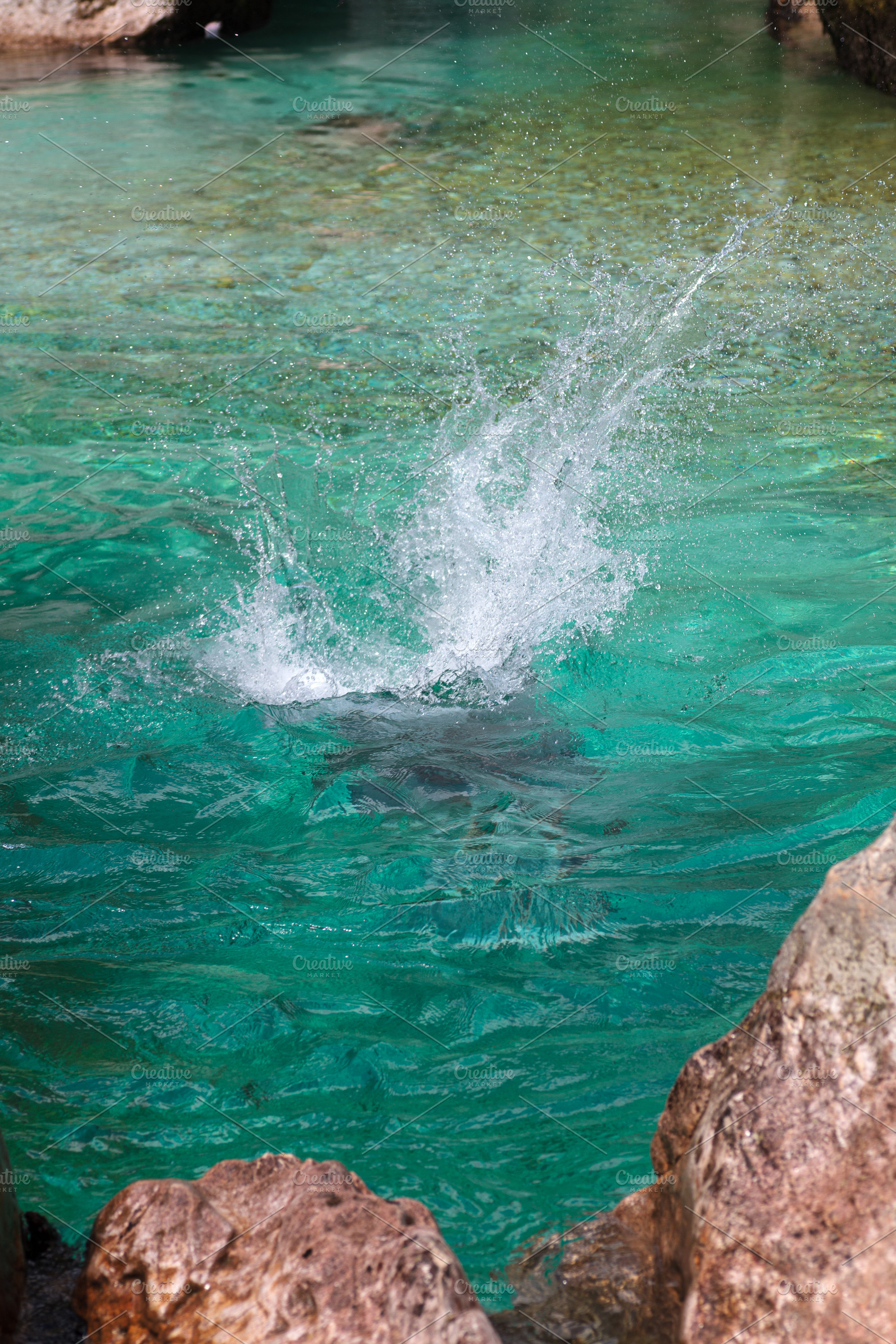 Man diving into the Soca river, a Nature Photo by Bepslabor