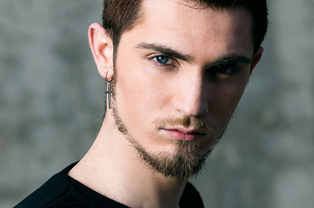 Handsome man looking featuring adult, attractive, and background, a Person Photo by Fotoeventis