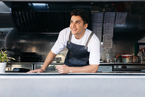 Portrait of a food truck owner, a Person Photo by Artem Varnitsin