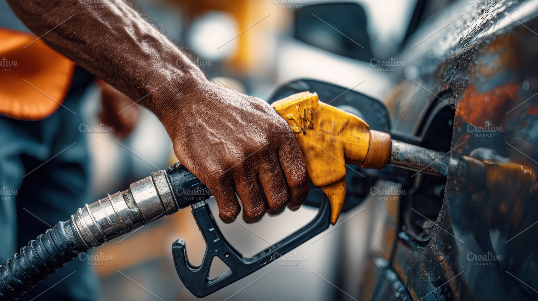 Hand fueling a car gas pump nozzle f, a Photo by Pixeness Studio