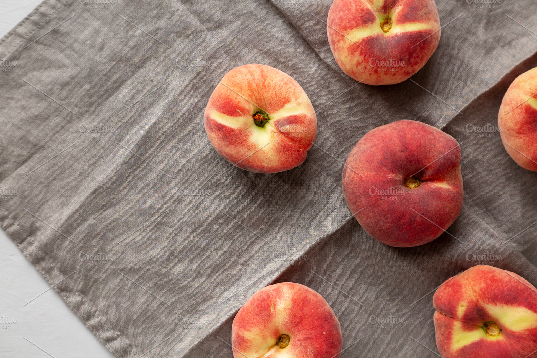Fresh juicy ripe fig peaches, top view. Overhead. Copy space., a Food & Drink Photo by LiudmylaChuhunova