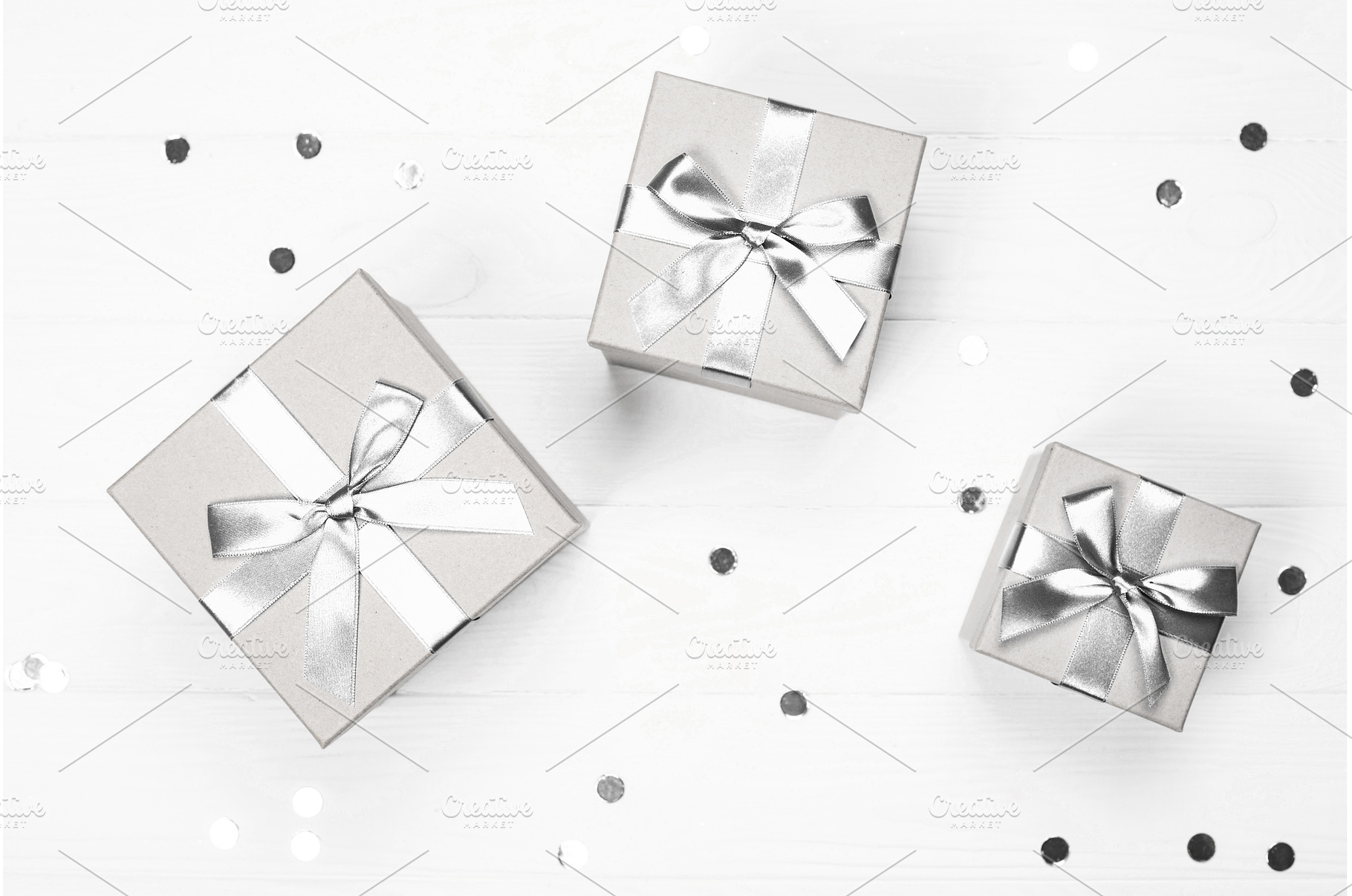 Silver gift boxes with ribbon bows, a Holiday Photo by Anna Efetova