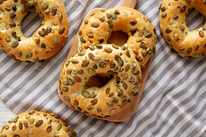Homemade Healthy Organic Pumpkin Seed Bagels for Breakfast, top, a Food & Drink Photo by LiudmylaChuhunova
