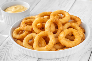 Crispy onion rings with cheese sauce, a Food & Drink Photo by Alexander Prokopenko