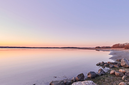 Calm beach and sea, a Photo by Peopleimages.com