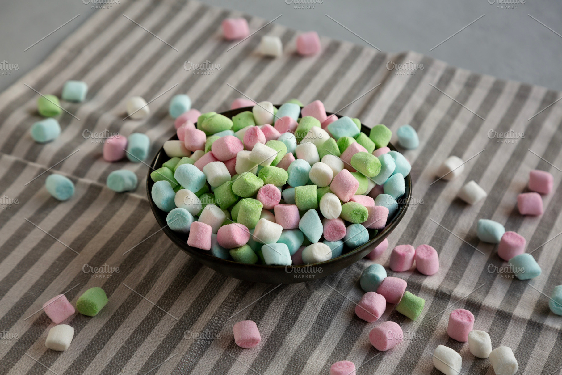 Fruity Colored Rainbow Marshmallows in a Bowl, side view., a Food & Drink Photo by LiudmylaChuhunova