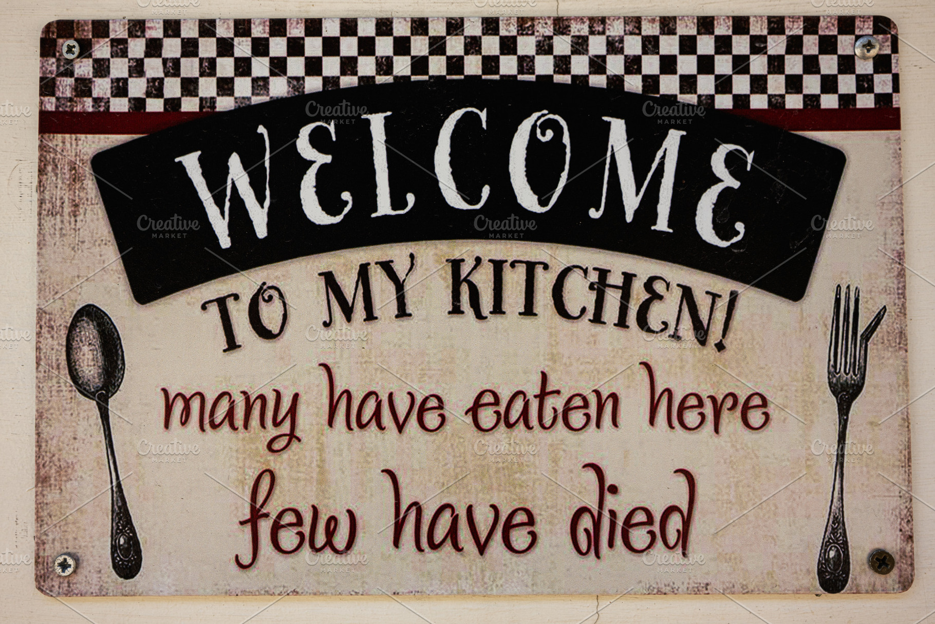 Humorous kitchen decor sign with playful text about food and safety, a Photo by AS photostudio