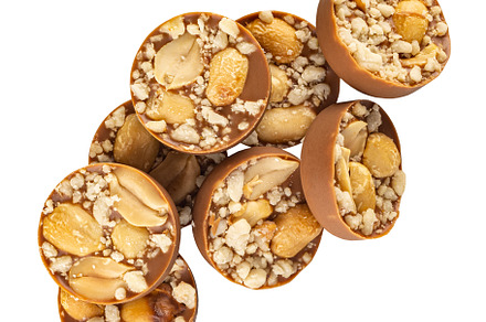 Milk chocolate praline with hazelnut, a Background Photo by Grafvision photography