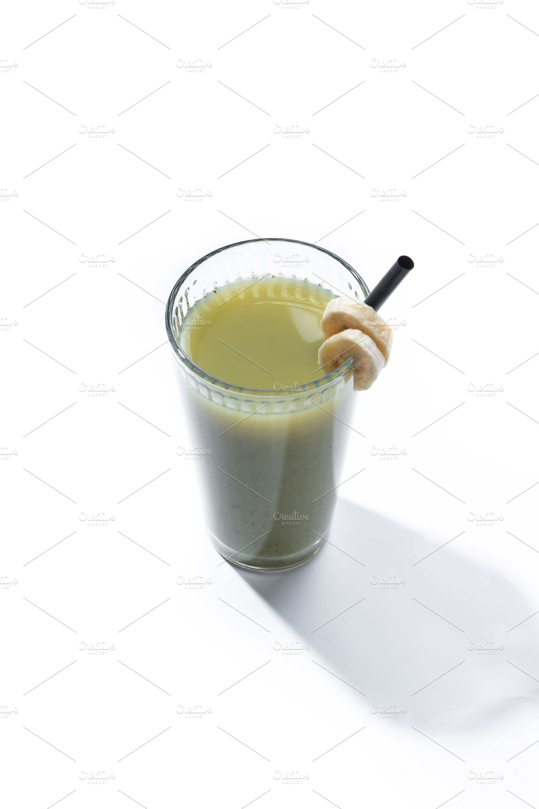Green smoothie with spinach,banana, apple, and lemon, a Food & Drink Photo by etorres69