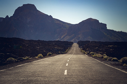 Empty road with mountain view, a Transportation Photo by Alex Polo