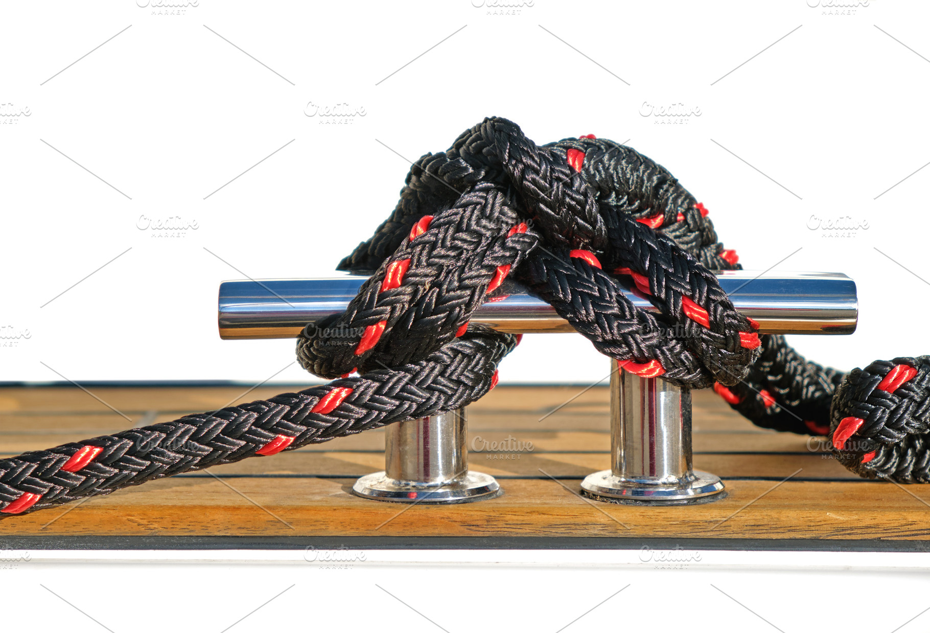 Metal cleat and mooring rope knot, an Industrial Photo by BOOCYS