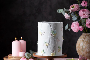 Homemade sweet cake on the pink tablecloth