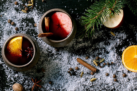 Hot mulled wine with spices and Christmas decorations, a Holiday Photo by Natasha Breen