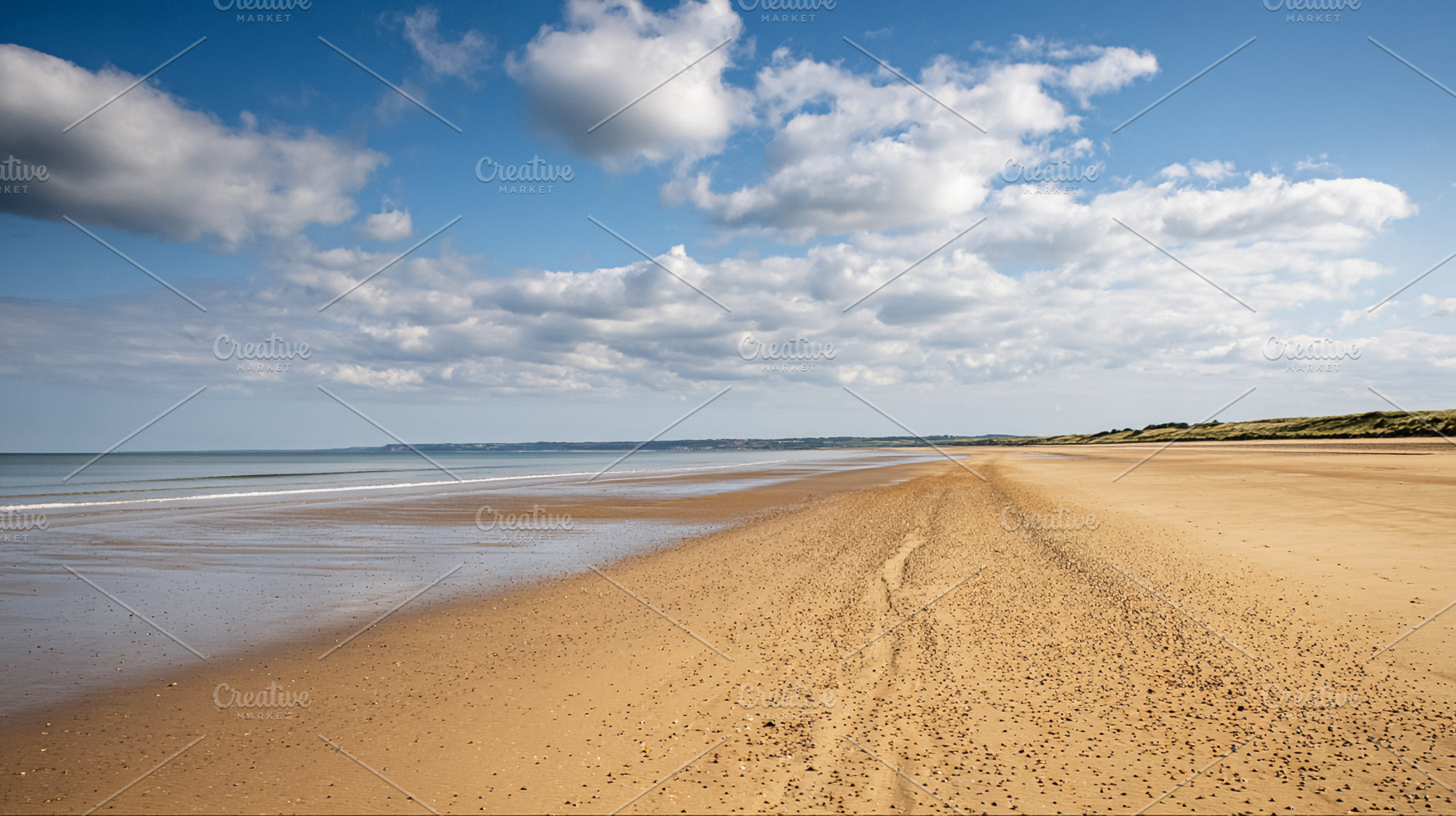 Omaha Beach, Normandy, World War II landing site with vast sandy, a Photo by Studio ANNA