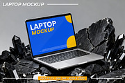 Laptop Mockup Displayed on Rocks, a Mac Mockup by Viswal Studio (Thumbnail 1 of 2)