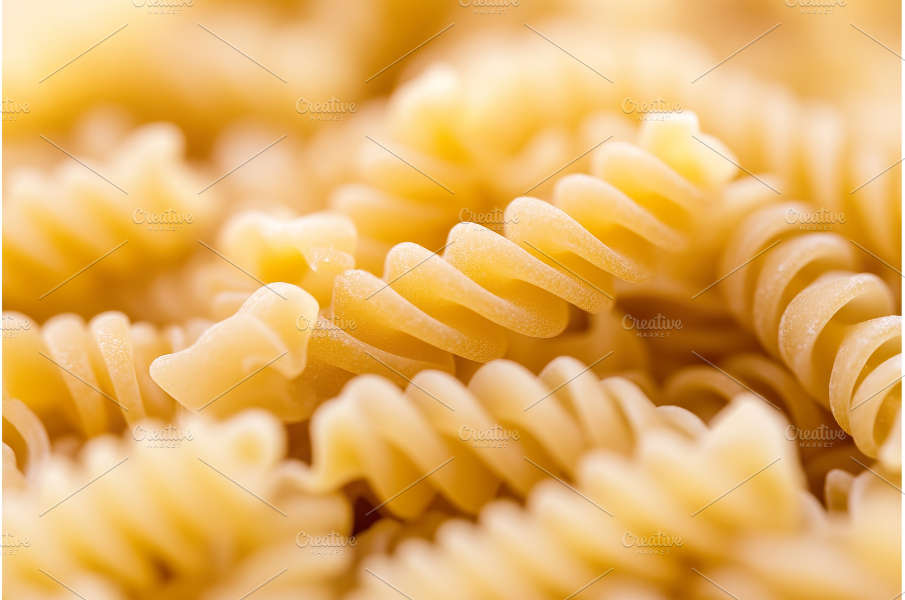 Close up of uncooked fusilli pasta, a Food & Drink Photo by Lermont51