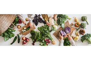 Female hands cutting various veggies