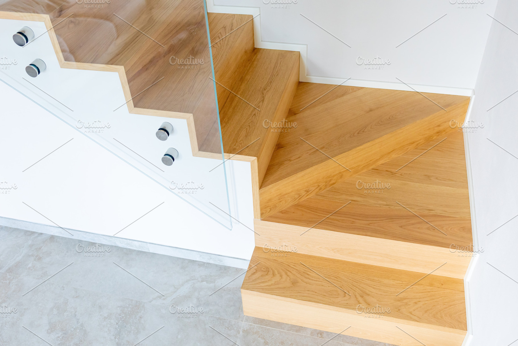 Modern oak staircase with glass balustrade connecting different floors, an Architecture Photo by Antonio Gravante Market