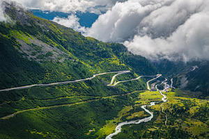 Alpine road with serpentines, a Nature Photo by Alpine Dreams